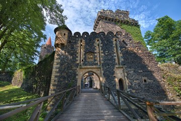 Wooden bridge and entrance portal to Gothic-Renaissance style Grodziec castle in Lower Silesia,...