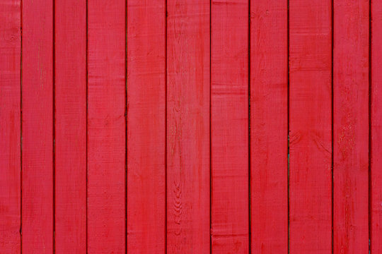 Painted red wooden wall panel (texture, background)
