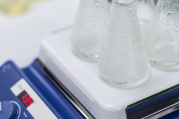 Experiment chemical solution mixing liquids on a Hotplate Stirrer in Lab.