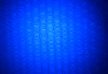 dark blue and light abstract background from plastic wrapper