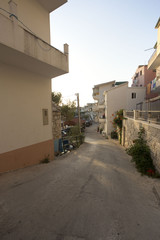 Fototapeta premium Narrow empty street of medieval town