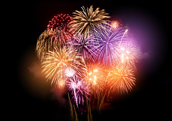 Bright and colourful fireworks display celebrations at night. - obrazy, fototapety, plakaty