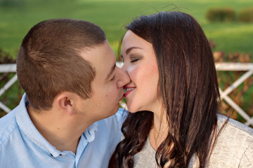 Fototapeta premium young couple family kissing