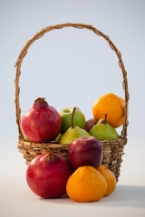 Close-up of various fruits in wicker basket