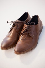 Pair of shoes against white background