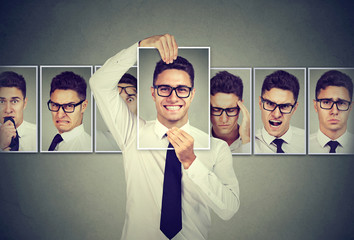 Masked young man in glasses expressing different emotions - obrazy, fototapety, plakaty
