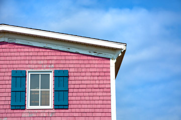 PInk house against blue sky