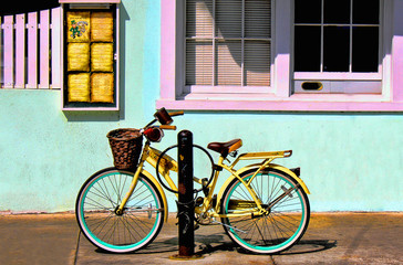 Fototapeta na wymiar Bicycle parked on a city street near 