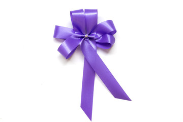 Blue bow as award ribbon on white background