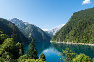 Long lake, one of many famous lakes in Jiuzhaigou during July.
