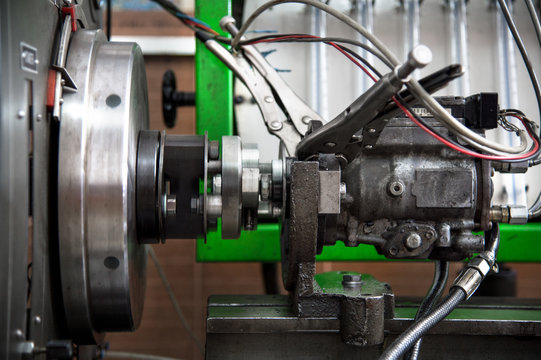 close-up high pressure diesel fuel pump test bench