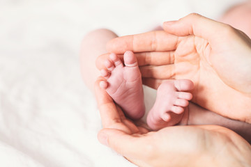Close-up newborn baby feet.
