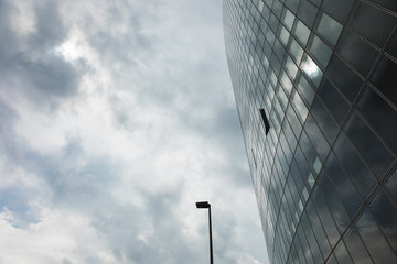 Close up street light and glass building