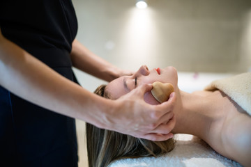 Obraz na płótnie Canvas Relaxing anti stress facial massage