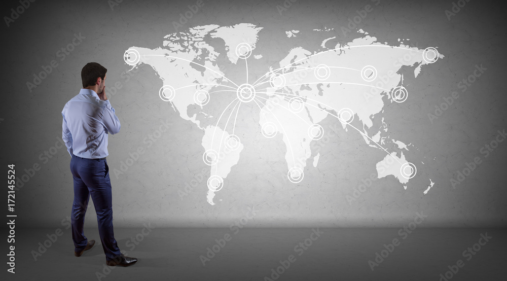 Poster businessman using digital planet earth interface on a wall 3d rendering