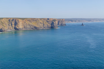 Fototapeta na wymiar Cliffs and ocean in Arrifana