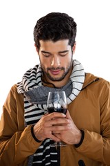 Man holding a glass of red wine