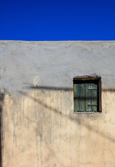 Old wooden window in a Greek village