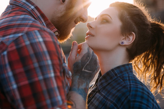 Romantic Hipster Couple Kiss. Youth Relationships Background. Tender Young People Together Closeup, Gentle Touch. Atmospheric Backlight With Focus On Foreground, Love Concept