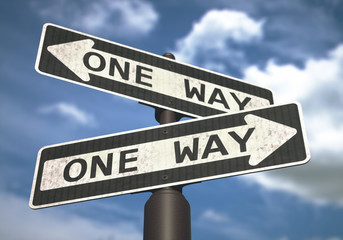 One Way Sign. Conceptual image of one-way sign with cloud and blue sky in the background.