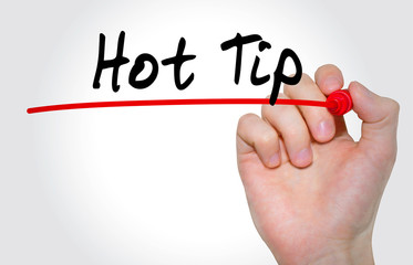 Hand writing inscription Hot tip with marker, concept
