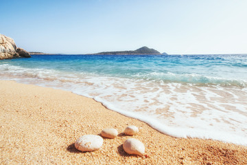 Fantastic views of the sea coast with yellow sand and blue water