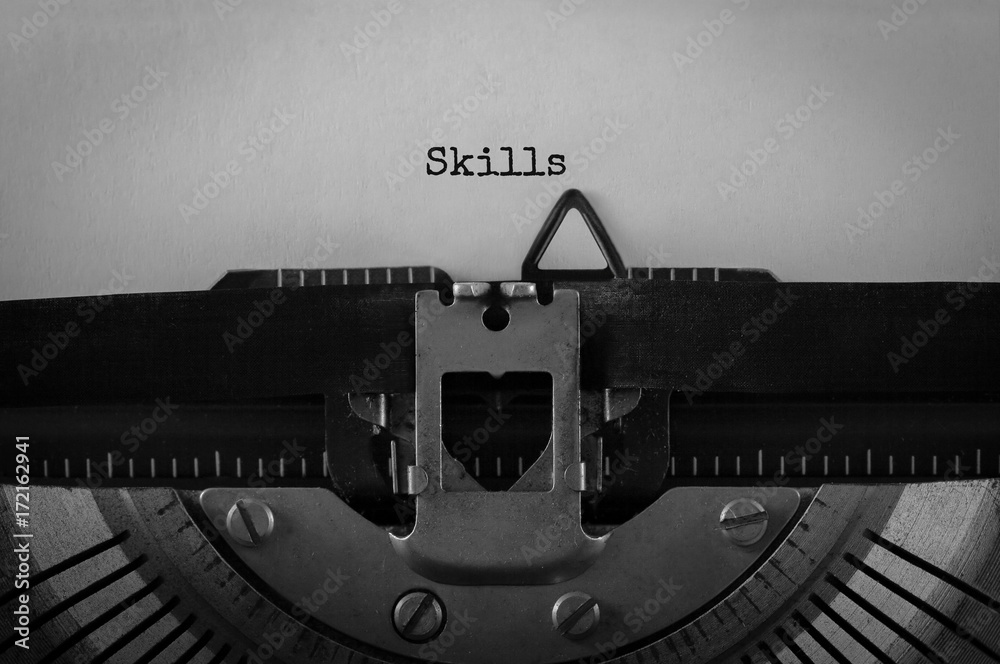 Aufkleber Text Skills typed on retro typewriter