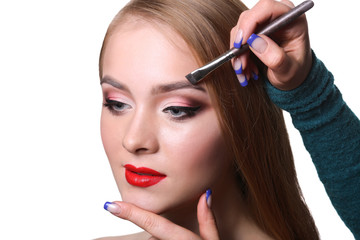 Make-up artist apply eyebrow shadow with brush, beauty