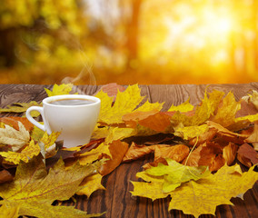 Autumn leaves and coffee.