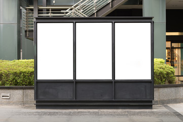 Large blank billboard on a street wall, banners with room to add your own text