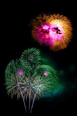 beautiful colorful firework display for celebration happy new year and merry christmas and  fireworks on black isolated background