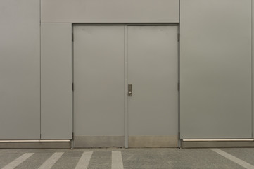 sidewalk by street wall & door