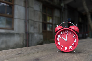 modern clock on wood table 