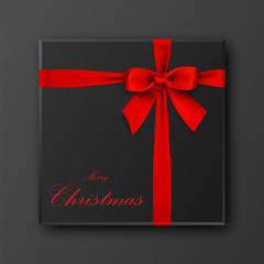 Black gift box with merry christmas text, red bow and ribbon, vector illustration