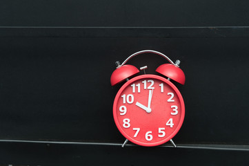 modern clock on wood table 