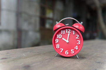 modern clock on wood table 