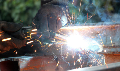 Welding work.sparks and smoke of a welding work