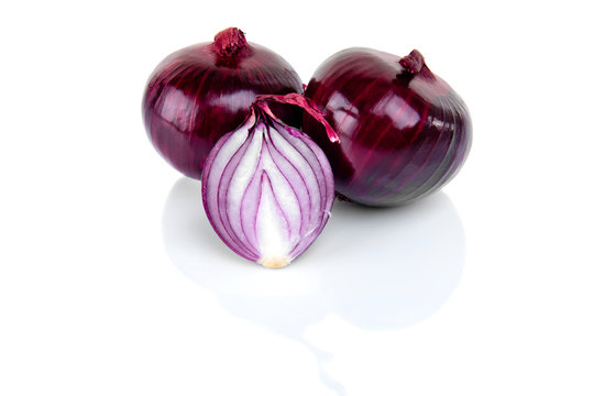 Red onion and half slice on white background with reflect.