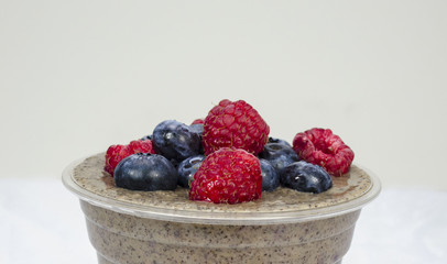 Buckwheat slurry with blueberries , rasberries and chia seeds