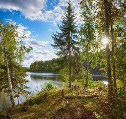 Autumn landscape colorful deciduous forests on the banks of rivers, lakes.
