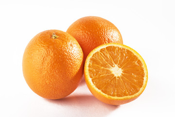 Delicious fresh oranges isolated on white background.