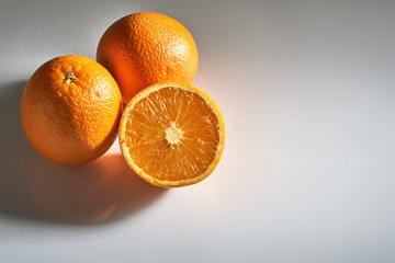 Delicious fresh oranges isolated on white background.