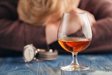 Man relax with alcohol after hard work