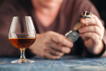 Man relax with alcohol after hard work