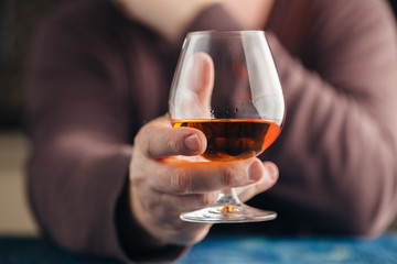 Lonely man drink alcohol on kitchen, alcoholism abuse