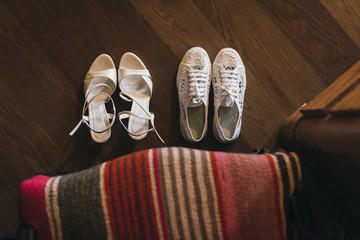 Two pair of white wedding shoes