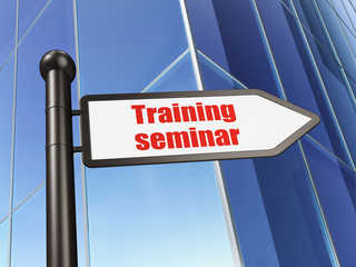 Education concept: sign Training Seminar on Building background