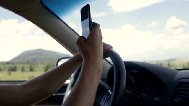 Man Drives Through Scenic Area Of Utah, Uses His Smartphone To Film Landscape, Slow Motion