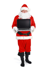 Santa Claus presents a laptop on white background