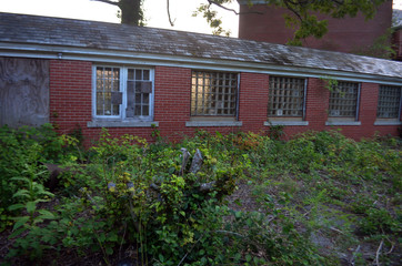 Exterior of old abandoned brick building